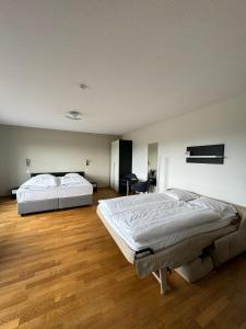 Voodi või voodid majutusasutuse Jura Sport & Spa Resort toas