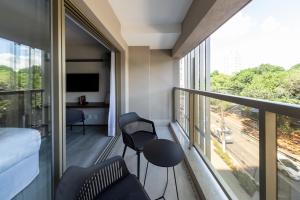 A balcony or terrace at Charlie On The Parc Ibirapuera Hotel