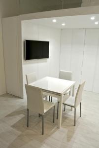 A television and/or entertainment centre at Duomo Inn