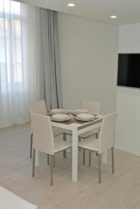 A television and/or entertainment centre at Duomo Inn
