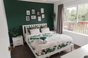 Katil atau katil-katil dalam bilik di Home away from Home - Jungle style