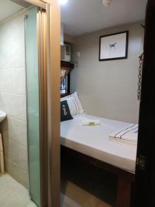 Letto o letti in una camera di Sun Guest House