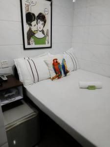 Letto o letti in una camera di Sun Guest House