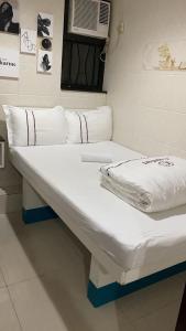 Letto o letti in una camera di Sun Guest House