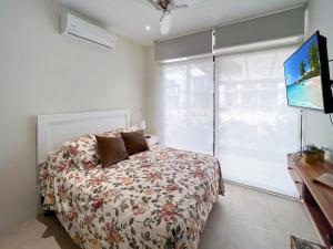Postel nebo postele na pokoji v ubytování Exclusive fully equipped Condo with great pool