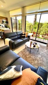 Posezení v ubytování Exclusive fully equipped Condo with great pool