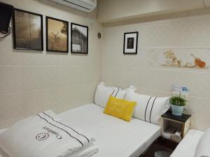 Letto o letti in una camera di Sun Guest House
