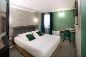 เตียงในห้องที่ Sure Hotel by Best Western Rouvignies Valenciennes +28 ภาพ