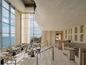 Umana Bali, LXR Hotels & Resorts by Hilton的休息区