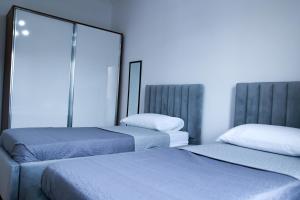 Posteľ alebo postele v izbe v ubytovaní Bianca Vista Tirana