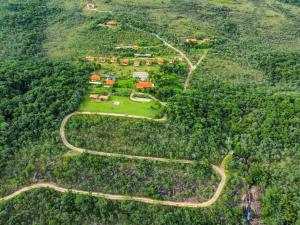 an aerial view of a village on a mountain at Pousada Sete Quedas in Carrancas