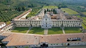 an aerial view of a large white building at Villa Guelfi in Cascina