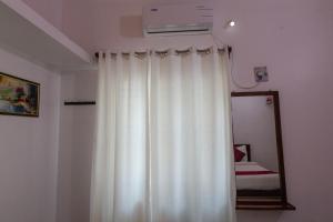 Postel nebo postele na pokoji v ubytování Sunflower Villa