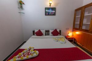 Postel nebo postele na pokoji v ubytování Sunflower Villa