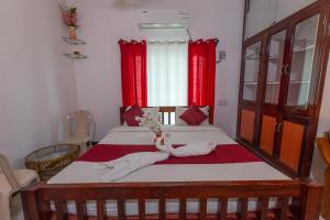 Postel nebo postele na pokoji v ubytování Sunflower Villa