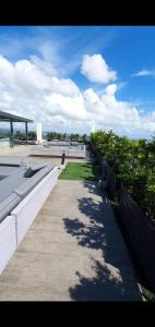 a row of benches on top of a building at Arlowes Cebu at 20f Grand Residences Cebu in Cebu City