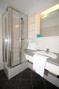Koupelna v ubytování Hotel Bauer