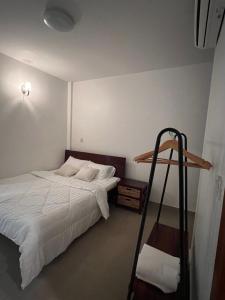 Postel nebo postele na pokoji v ubytování D32 Homestay near airport Behind Brown coffee airport + 5 fotografií