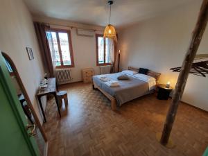 Postel nebo postele na pokoji v ubytování Residenza La Veranda a Rialto