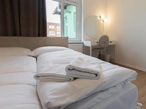 Posteľ alebo postele v izbe v ubytovaní VacationClub – Aleja I Armii Wojska Polskiego 6
