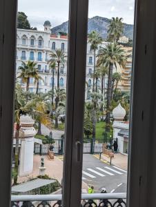 a view from a window of a building at 2 pièces , Centre ville , 100 mètres des plages. in Menton