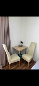 Posezení v ubytování Privatzimmer , mit sehr guter Verkehrsanbindung