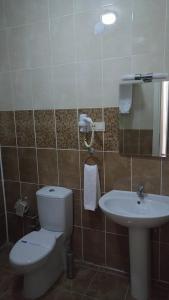 Uma casa de banho em Butik Ertur Hotel