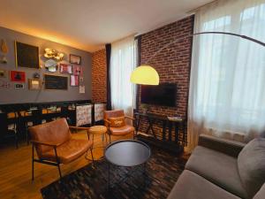 TV/trung tâm giải trí tại Les Appartements de Champagne