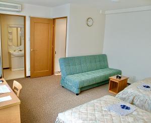 Yonago Universal Hotel客房内的一张或多张床位