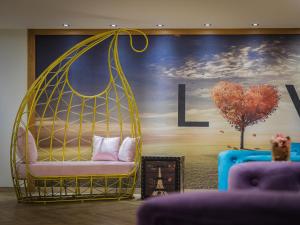 A seating area at Good Time Boutique Hotel
