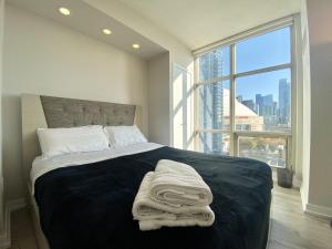 Tempat tidur dalam kamar di Luxury Homestay