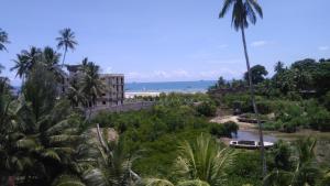 a view of the beach from the resort at Bamboo House BnB in Bondeni