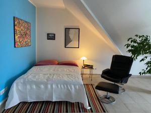 Кровать или кровати в номере Stockmann in Retgendorf - ABC174