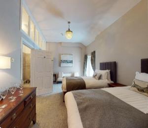 Letto o letti in una camera di Newbay House Wexford