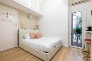 Ένα ή περισσότερα κρεβάτια σε δωμάτιο στο Leonina Apt - Colosseum