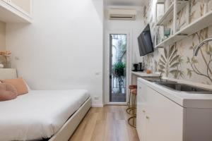 Μια τηλεόραση ή/και κέντρο ψυχαγωγίας στο Leonina Apt - Colosseum
