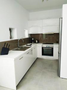 Η κουζίνα ή μικρή κουζίνα στο Ethereal Southcrete Villas