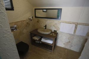 Ванная комната в GLENN HOTEL& BEACH