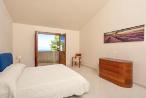 Кровать или кровати в номере Villa Manuela