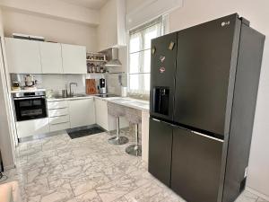 Kuchyň nebo kuchyňský kout v ubytování Gigi's Place