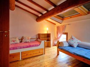 a bedroom with two beds in a room at Welcome Traveller BERNARDO HOUSE in Garda