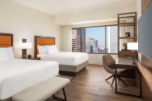 Postel nebo postele na pokoji v ubytování Hyatt Regency Phoenix Downtown