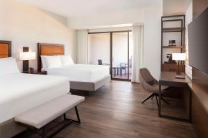 Postel nebo postele na pokoji v ubytování Hyatt Regency Phoenix Downtown