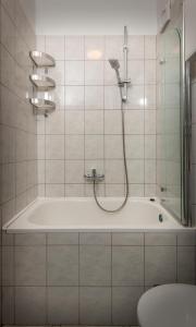 Kúpeľňa v ubytovaní Apartman PeTaDo