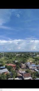 an aerial view of a city with houses and trees at Adam&Eva Condo Staycation in Lapu Lapu City