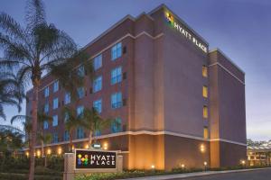 a hotel building with a sign in front of it at Hyatt Place at Anaheim Resort / Convention Center in Anaheim