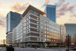 a building with a sign on top of it at Hyatt House Raleigh North Hills in Raleigh