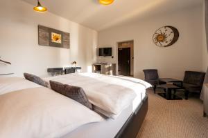 Posteľ alebo postele v izbe v ubytovaní Padre Boutique Hotel