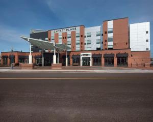 a large building with an airplane on top of it at Hyatt Place Moncton-Downtown in Moncton
