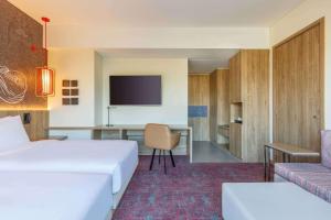 Ένα ή περισσότερα κρεβάτια σε δωμάτιο στο Hyatt Centric Soalteemode Kathmandu